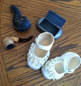 Olivia Newport old pipe and baby shoes