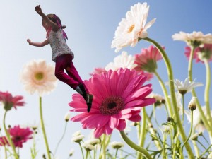 Olivia Newport Girl jumping out of flower